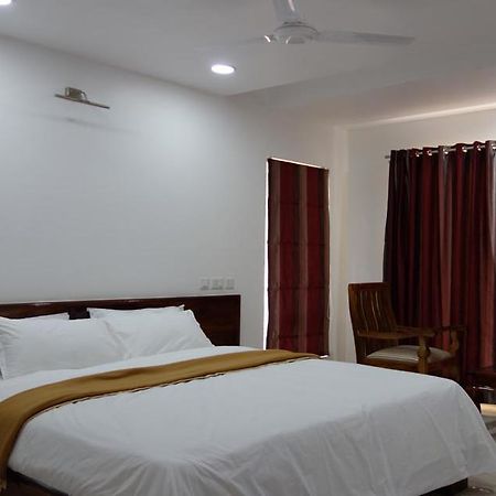 วูดดี้ วูด โฮม สเตย์ Apartment Kodagu ภายนอก รูปภาพ