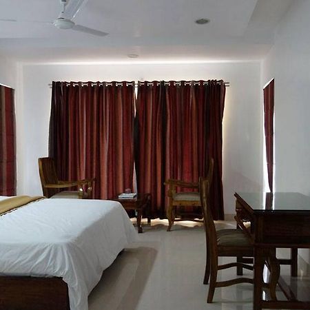 วูดดี้ วูด โฮม สเตย์ Apartment Kodagu ภายนอก รูปภาพ